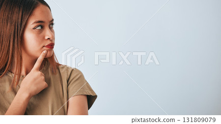 Thinking, woman and space for idea in studio with .advertising or product placement mockup. Face of female on white background doubt or planning logo and brand decision or sale promotion announcement 131809079