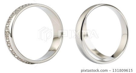 Two elegant wedding bands one with diamonds the other plain isolated on white background 131809615