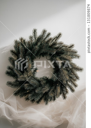 Beautiful Green Wreath With Warm Lights and Soft Fabric for Holiday Decoration 131809874
