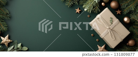 Festive Holiday Gift Decoration With Natural Elements and Stars on Green Background 131809877