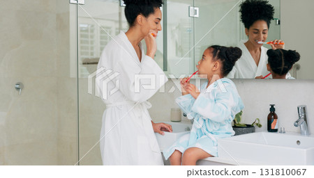 Dental, brushing teeth and bathroom mother, child or people with toothbrush, toothpaste or morning routine. Tooth cleaning, enamel care or home mom, kid or family gum health, hygiene or oral wellness 131810067