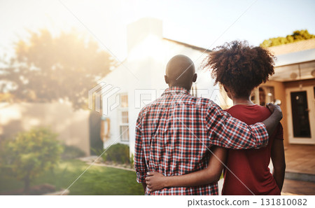 Back view, black couple and hug outdoor at house, real estate and new loan for luxury home. Man, woman and people in front of property investment, moving and dream neighborhood for building mortgage Back view, black couple and hug outdoor at house, real estate and new loan for luxury home. Man, woman and people in front of property investment, moving and dream neighborhood for building mortgage 131810082