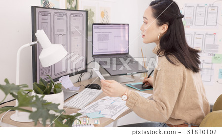 Computer, phone design and a business asian woman at work in her office on technology development. Planning, creative and hardware with a young employee working on a graphic model of a mobile product Computer, phone design and a business asian woman at work in her office on technology development. Planning, creative and hardware with a young employee working on a graphic model of a mobile product 131810102