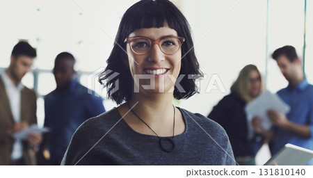 Leadership, portrait and business woman in the office with confidence after planning a project. Happy, smile and professional female corporate employee standing in workplace after working with team. 131810140