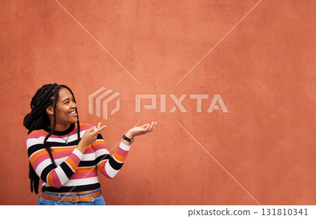 Mockup, happy or black woman with marketing, product placement or branding space on wall background. Smile or African gen z girl advertising discount deal, sales offer or promotion announcement 131810341