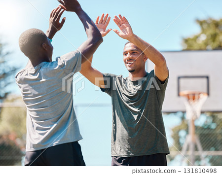 Sports success, team celebration and basketball player celebrate fitness challenge, game or competition win. Partnership teamwork, winner and African athlete happy for training exercise achievement 131810498