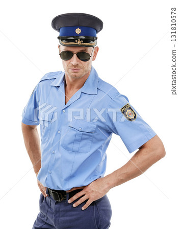 Officer, security and portrait of police on white background for authority, public safety and crime. Justice, law enforcement and isolated policeman, traffic cop and guard with hands on hip in studio 131810578