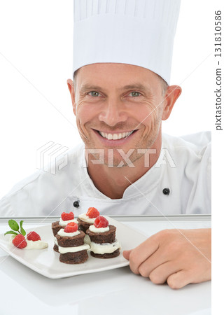 Man, face and chef, dessert in portrait and smile, baker skill and cake presentation isolated on white background. Happy person, chocolate and fruit for Valentines day plate and hospitality in studio Man, face and chef, dessert in portrait and smile, baker skill and cake presentation isolated on white background. Happy person, chocolate and fruit for Valentines day plate and hospitality in studio 131810586