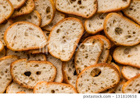 Crispy roasted bruschetta bread. Top view. 131810658