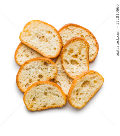 Crispy roasted bruschetta bread isolated on white background. Crispy roasted bruschetta bread isolated on white background. 131810660