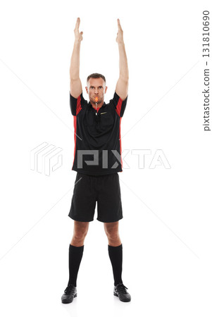 Referee, man whistle in portrait and arms raised, stop game with soccer and sport isolated on white background. Serious, assertive and fitness with mockup, football match and hand signal in studio Referee, man whistle in portrait and arms raised, stop game with soccer and sport isolated on white background. Serious, assertive and fitness with mockup, football match and hand signal in studio 131810690