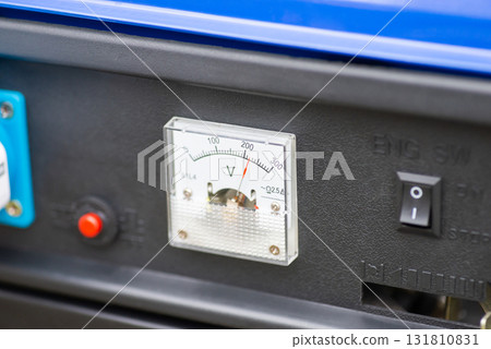 Voltmeter of autonomous energy generator showing 220 volts of power. Gasoline generator working perfectly 131810831