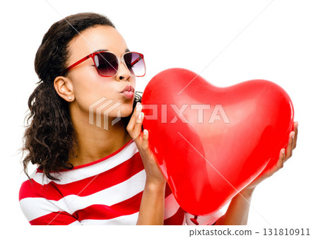 Heart, kiss and valentines day with a black woman in studio isolated on a white background for love or romance. Red, romantic and dating with a female holding an icon, symbol or emoji on blank space Heart, kiss and valentines day with a black woman in studio isolated on a white background for love or romance. Red, romantic and dating with a female holding an icon, symbol or emoji on blank space 131810911