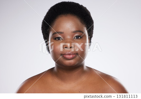 Black woman, skincare beauty and studio portrait with healthy skin glow, wellness and happy for self care. Isolated african model, cosmetics and makeup for dermatology, aesthetic and facial health Black woman, skincare beauty and studio portrait with healthy skin glow, wellness and happy for self care. Isolated african model, cosmetics and makeup for dermatology, aesthetic and facial health 131811113