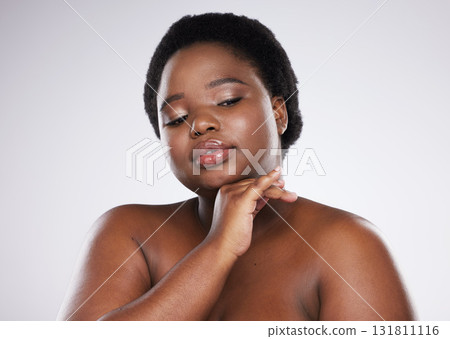 Skincare, beauty glow and black woman with cosmetic self care for spa and makeup aesthetic. White background, isolated and studio model with cosmetics from dermatology and facial wellness results Skincare, beauty glow and black woman with cosmetic self care for spa and makeup aesthetic. White background, isolated and studio model with cosmetics from dermatology and facial wellness results 131811116