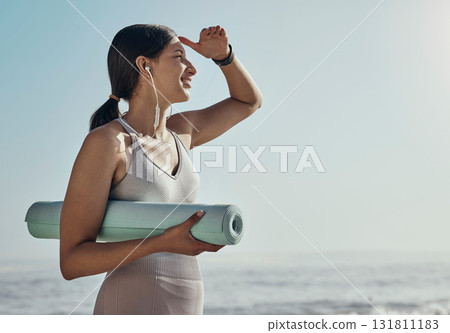 Fitness, peace and yoga mat by woman at the beach for exercise, balance and cardio on blue sky background. Meditation, training and girl relax at the ocean for wellness, peace and zen at the sea Fitness, peace and yoga mat by woman at the beach for exercise, balance and cardio on blue sky background. Meditation, training and girl relax at the ocean for wellness, peace and zen at the sea 131811183