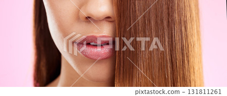 Beauty, hair and mouth of black woman isolated in studio with pink background for salon advertising. Haircare, straightener and Brazilian hairstyle on model for luxury spa growth product promotion. 131811261