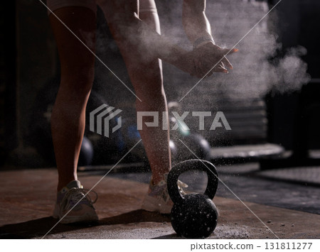Fitness, man or exercise with kettlebell, powder or bodybuilding for wellness, energy or healthy lifestyle. Male, guy or athlete with gym equipment, heavy weight or mindset for training or chalk dust Fitness, man or exercise with kettlebell, powder or bodybuilding for wellness, energy or healthy lifestyle. Male, guy or athlete with gym equipment, heavy weight or mindset for training or chalk dust 131811277