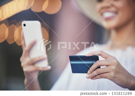 Woman, hands and phone with credit card for online shopping, ecommerce or purchase in the city. Hand of happy female shopper holding smartphone for internet banking app, 5G connection or transaction Woman, hands and phone with credit card for online shopping, ecommerce or purchase in the city. Hand of happy female shopper holding smartphone for internet banking app, 5G connection or transaction 131811289