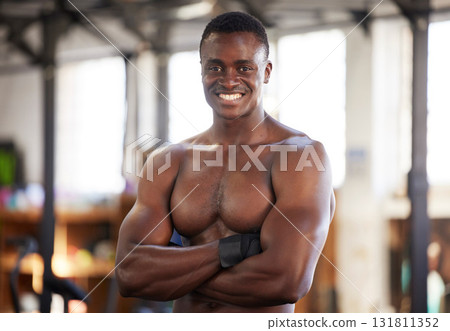 Happy, fitness and portrait of man at gym proud, smile and relax with empowered, mindset and blurred background. Face, bodybuilder and positivity by black guy training, workout and exercise routine Happy, fitness and portrait of man at gym proud, smile and relax with empowered, mindset and blurred background. Face, bodybuilder and positivity by black guy training, workout and exercise routine 131811352