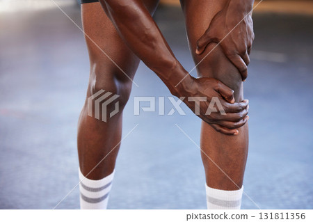 Knee pain, hands and man at gym with injury, hurt or sore during fitness, training and exercise on mockup space. Sports, accident and legs of guy with muscle, arthritis or inflammation during workout Knee pain, hands and man at gym with injury, hurt or sore during fitness, training and exercise on mockup space. Sports, accident and legs of guy with muscle, arthritis or inflammation during workout 131811356