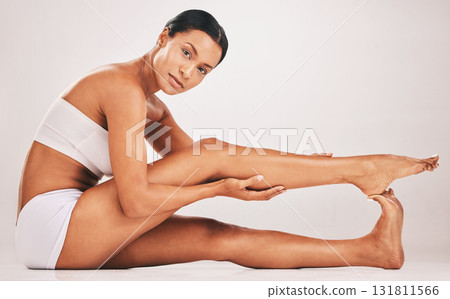 Body, legs and portrait of black woman for health and wellness in studio for skincare epilation and self care. Underwear model person on grey background for healthy diet, hair removal and spa results Body, legs and portrait of black woman for health and wellness in studio for skincare epilation and self care. Underwear model person on grey background for healthy diet, hair removal and spa results 131811566
