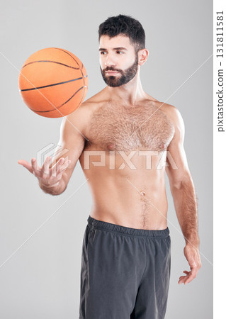 Fitness, sport and man throwing basketball in air, topless sports player isolated on grey background. Exercise, motivation and training, male model with workout mindset and strong muscle in studio. Fitness, sport and man throwing basketball in air, topless sports player isolated on grey background. Exercise, motivation and training, male model with workout mindset and strong muscle in studio. 131811581