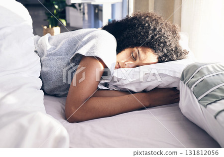 Sleep, bedroom and relax with a black woman in bed, dreaming or resting in the morning at home. Sleeping, tired and rest with an attractive young female asleep in her house over the weekend Sleep, bedroom and relax with a black woman in bed, dreaming or resting in the morning at home. Sleeping, tired and rest with an attractive young female asleep in her house over the weekend 131812056