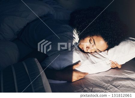Black woman, bed and sleeping at night for peace, quiet and rest or relax in home bedroom. Person with pillow to dream, security or for calm sleep with nap or comfort with duvet for wellness Black woman, bed and sleeping at night for peace, quiet and rest or relax in home bedroom. Person with pillow to dream, security or for calm sleep with nap or comfort with duvet for wellness 131812061