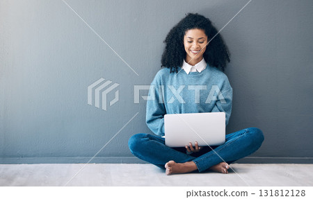 Laptop, happy and research with black woman on floor for social media, news and designer on wall mockup. Website, online shopping and technology with girl for communication, internet and advertising 131812128