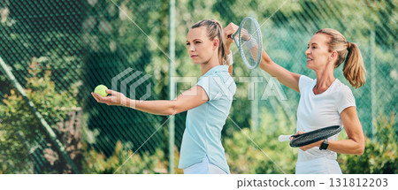 Tennis training, sport and women together on outdoor turf, instructor or coach with fitness, motivation and help. Exercise, sports lesson and athlete workout, teaching and learning skill on court Tennis training, sport and women together on outdoor turf, instructor or coach with fitness, motivation and help. Exercise, sports lesson and athlete workout, teaching and learning skill on court 131812203
