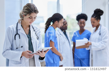 Doctor, healthcare and woman with tablet, team and update results for procedure, charts and focus. Medical professional, staff and female employee with device, telehealth and online reading for cure Doctor, healthcare and woman with tablet, team and update results for procedure, charts and focus. Medical professional, staff and female employee with device, telehealth and online reading for cure 131812497