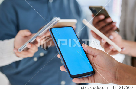 Green screen, mockup and smartphone in hands, team with marketing and technology, product placement. Business people, diversity and networking, social media and communication, collaboration and ux 131812509