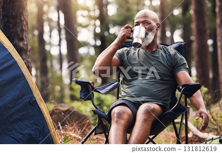 Camping, hiking and coffee with a senior black man in the forest enjoying a drink during retirement. Nature, relax and wellness with an elderly male drinking a beverage in the woods on a hike Camping, hiking and coffee with a senior black man in the forest enjoying a drink during retirement. Nature, relax and wellness with an elderly male drinking a beverage in the woods on a hike 131812619