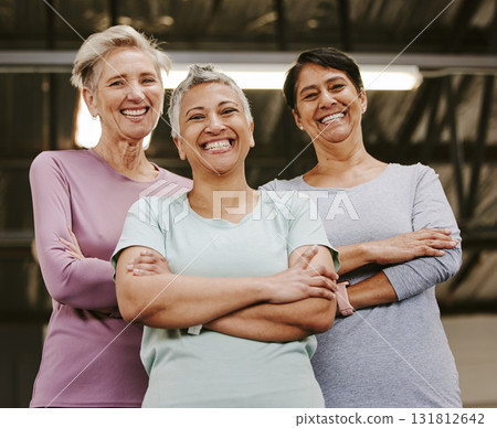 Senior woman, exercise group and portrait with arms crossed, smile and support for wellness goal. Elderly women, team building and happiness at gym for friends, solidarity or diversity for motivation Senior woman, exercise group and portrait with arms crossed, smile and support for wellness goal. Elderly women, team building and happiness at gym for friends, solidarity or diversity for motivation 131812642