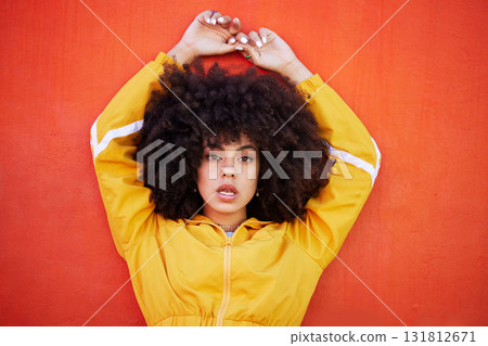 Portrait, fierce and black woman with attitude, power and empowerment with afro on studio background. Face, African American female creative and lady with confidence, casual outfit and motivation 131812671