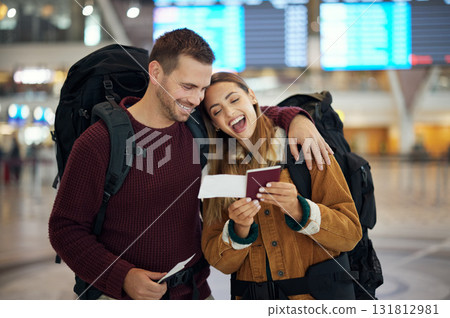 Ticket, travel and couple at airport with passport talking, chatting or laughing at funny joke. Valentines day, comic and happy man and woman in airline lobby with flight documents and boarding pass. 131812981