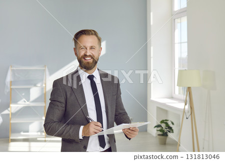 Portrait of smiling confident and successful Caucasian male realtor or real estate agent. 131813046