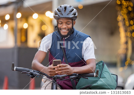 Bicycle, delivery and black man phone for courier services, fintech and ecommerce location, chat app and city transport. Smartphone, 5g technology and logistics driver with bag for fast online order Bicycle, delivery and black man phone for courier services, fintech and ecommerce location, chat app and city transport. Smartphone, 5g technology and logistics driver with bag for fast online order 131813083