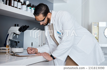Science, writing and man in laboratory for research, medical report and analytics on clipboard. Pharmaceutical medicine, healthcare and scientist write notes for data analysis, test results and study Science, writing and man in laboratory for research, medical report and analytics on clipboard. Pharmaceutical medicine, healthcare and scientist write notes for data analysis, test results and study 131813090