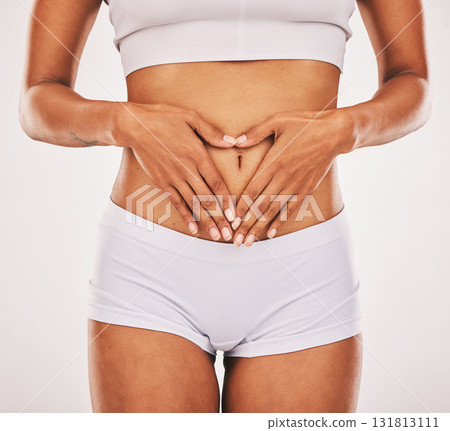 Gut health, hands in heart and stomach of woman on white background for digestion, diet and weight loss. Fitness, body wellness and abdomen of girl for healthy lifestyle, tummy tuck and liposuction Gut health, hands in heart and stomach of woman on white background for digestion, diet and weight loss. Fitness, body wellness and abdomen of girl for healthy lifestyle, tummy tuck and liposuction 131813111