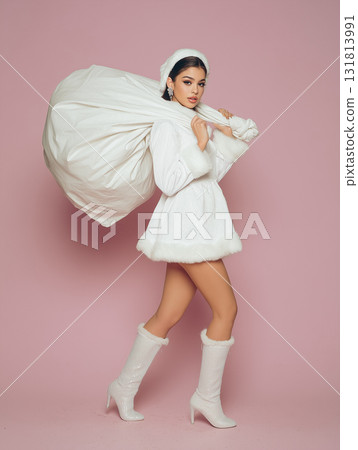 Female model in white Santa costume | Cute and sophisticated white Christmas fashion image 131813991