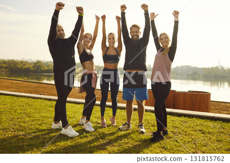 Portrait of Friends Sport Team Celebrating in City Park Portrait of Friends Sport Team Celebrating in City Park 131815762