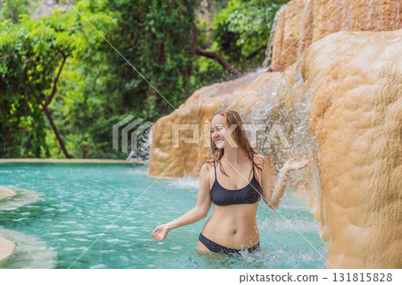 Female tourist exploring Grutas Tolantongo in Mexico, enjoying natural hot springs, scenic caves, and outdoor adventure. Travel, wellness, and sightseeing concept Female tourist exploring Grutas Tolantongo in Mexico, enjoying natural hot springs, scenic caves, and outdoor adventure. Travel, wellness, and sightseeing concept 131815828