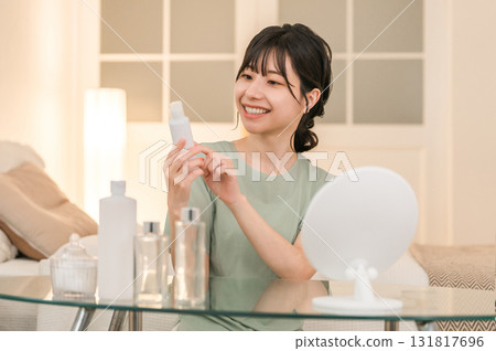 Young Asian woman doing skin care and night care before going to bed at night 131817696