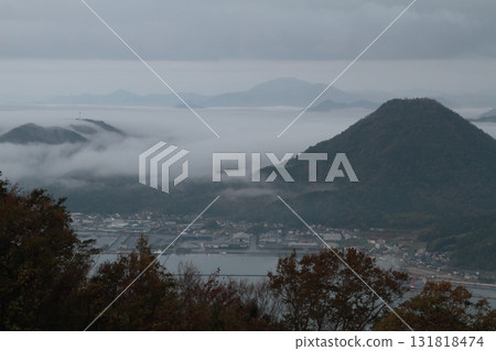 Mountaintop with a view of the sea of clouds Mountaintop with a view of the sea of clouds 131818474