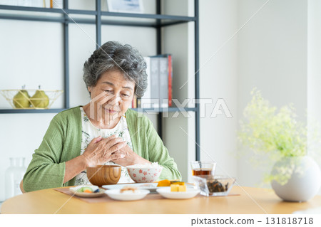 Senior woman with poor appetite 131818718