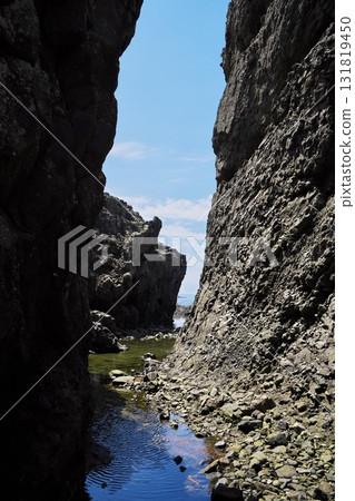 Cape Tappi in summer: View of strange rock formations from the promenade to Takihama Beach Cape Tappi in summer: View of strange rock formations from the promenade to Takihama Beach 131819450
