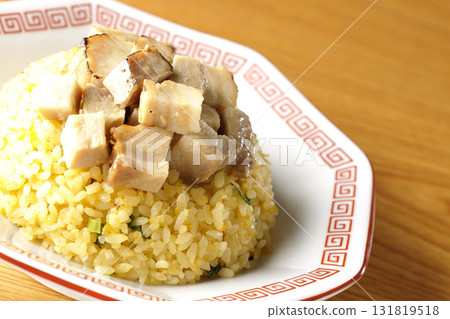 Egg fried rice topped with diced pork Egg fried rice topped with diced pork 131819518