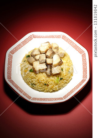 Egg fried rice topped with diced pork Egg fried rice topped with diced pork 131819842